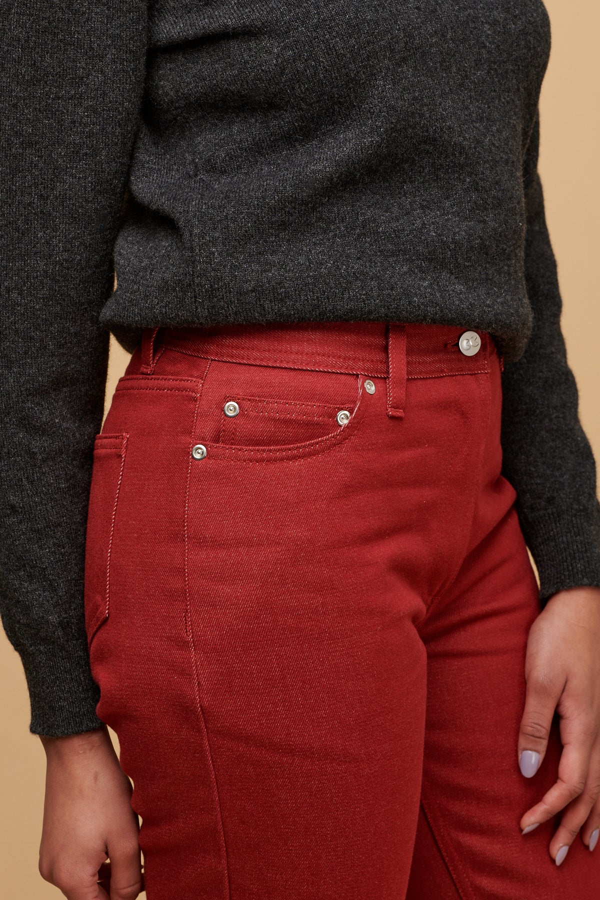 
            Close up of the front of women&#39;s Gloria jean with three front pockets including coin pocket and silver rivets, CC logo button fastening 