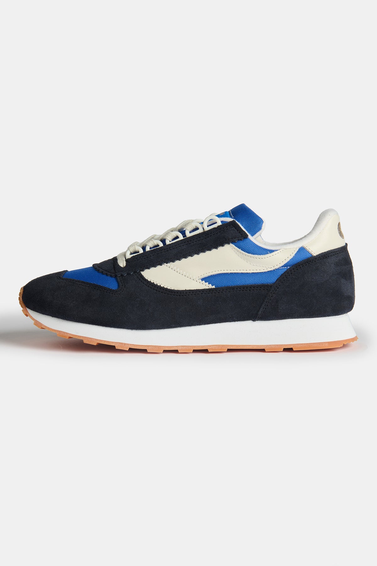 
            Side view of women&#39;s Parlick style Trainer in blue/ navy/ off white